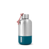 BLACK+BLUM Explorer orange insulated water bottle showing sleek design and vibrant color for hot or cold beverages.