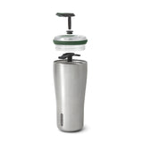BLACK+BLUM travel tumbler insulated cup with black exterior and stainless steel interior, designed for hot and cold beverages.