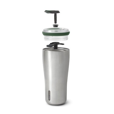 BLACK+BLUM travel tumbler insulated cup with black exterior and stainless steel interior, designed for hot and cold beverages.