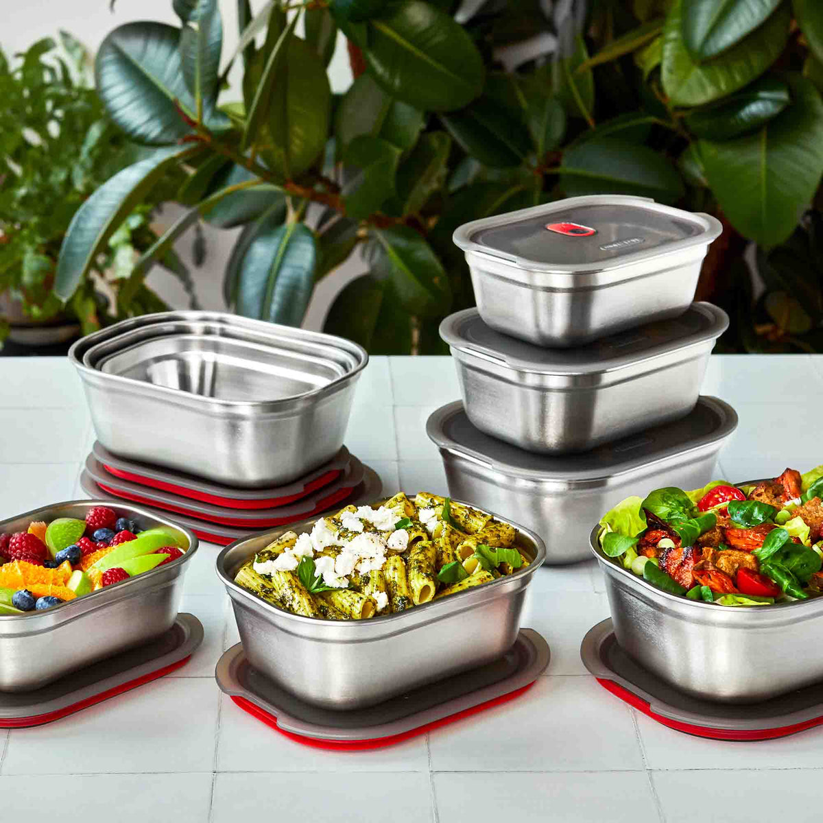 BLACK+BLUM multifunction storage containers set with 3 sizes in black, featuring secure lids and sleek design for kitchen organization