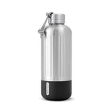 BLACK+BLUM Explorer insulated flask in vibrant orange with a sleek stainless steel body and black screw-on lid.