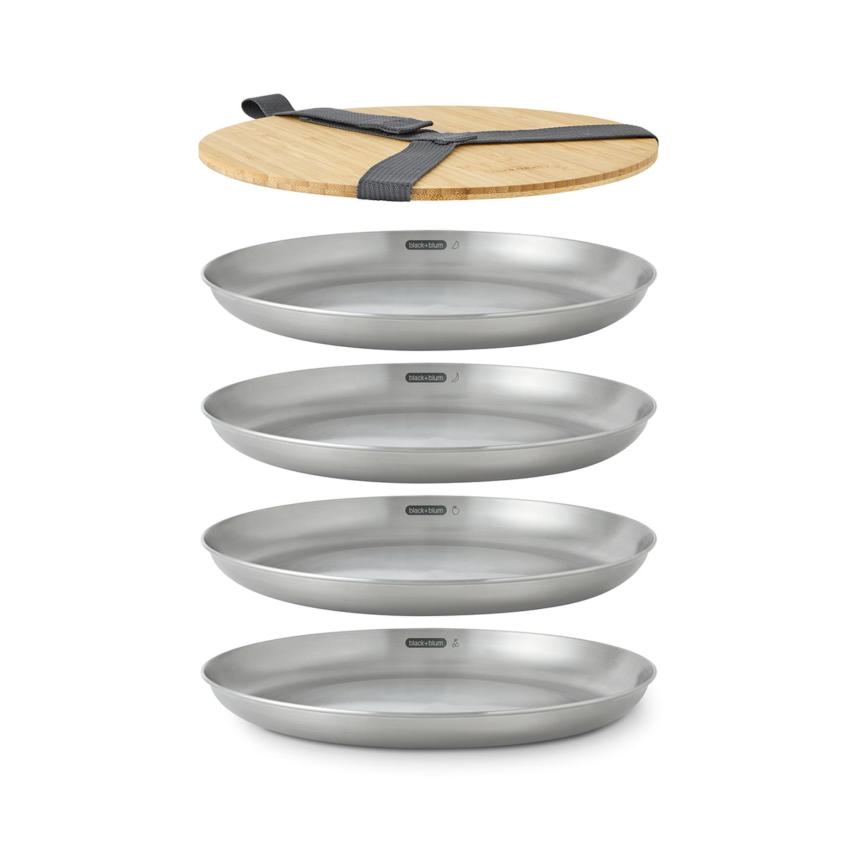 Set of four BLACK+BLUM PICKNICK stainless steel plates, durable and lightweight for outdoor dining or picnics.
