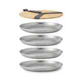 Set of four BLACK+BLUM PICKNICK stainless steel plates, durable and lightweight for outdoor dining or picnics.