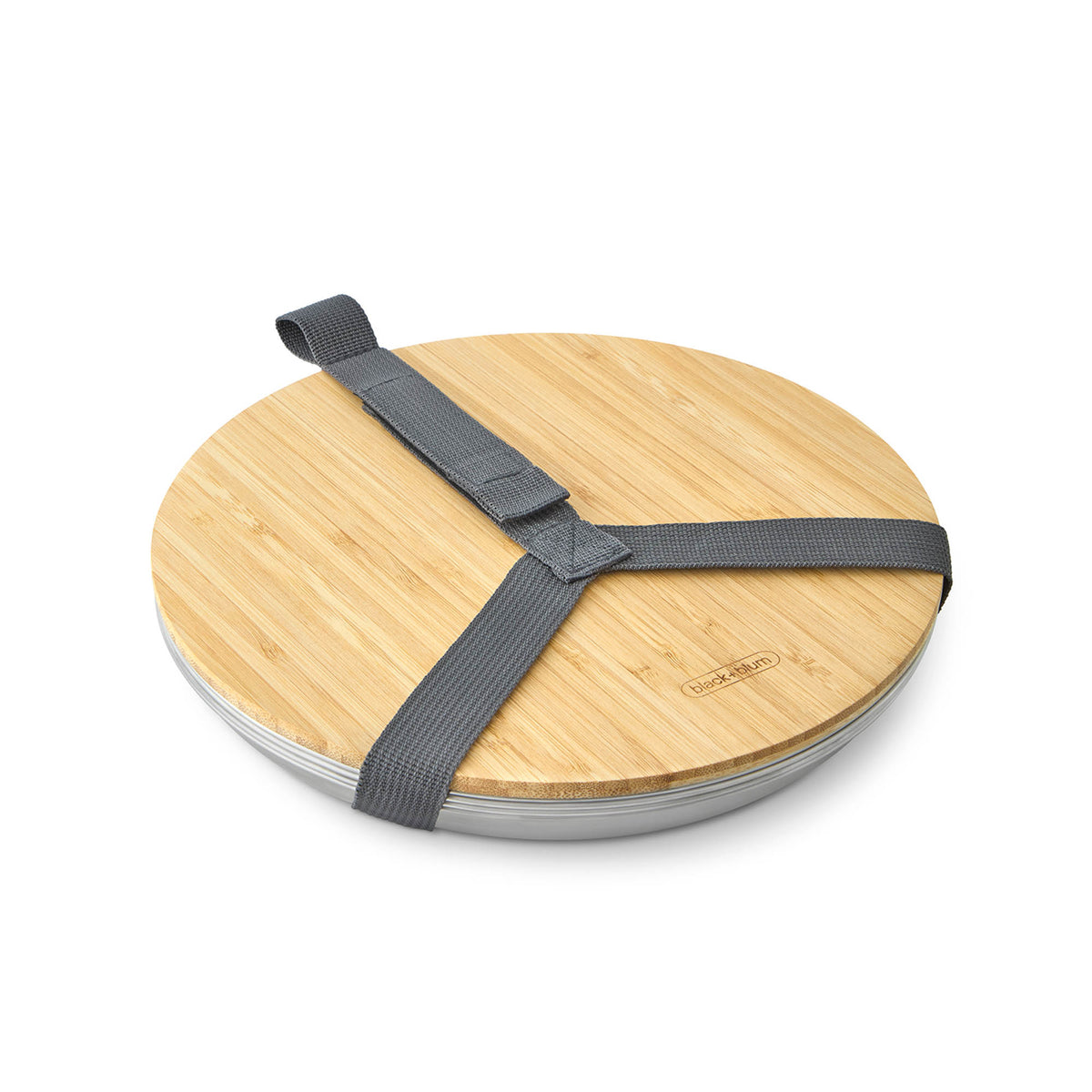 Set of four BLACK+BLUM PICKNICK stainless steel plates, durable and lightweight dinnerware for outdoor meals.