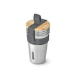BLACK+BLUM stainless steel to-go lunch becher set with four durable, eco-friendly tumblers for portable meals.