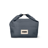 BLACK+BLUM lunchbag in black with a 6.7-liter capacity, featuring a sleek, compact design for carrying meals conveniently.