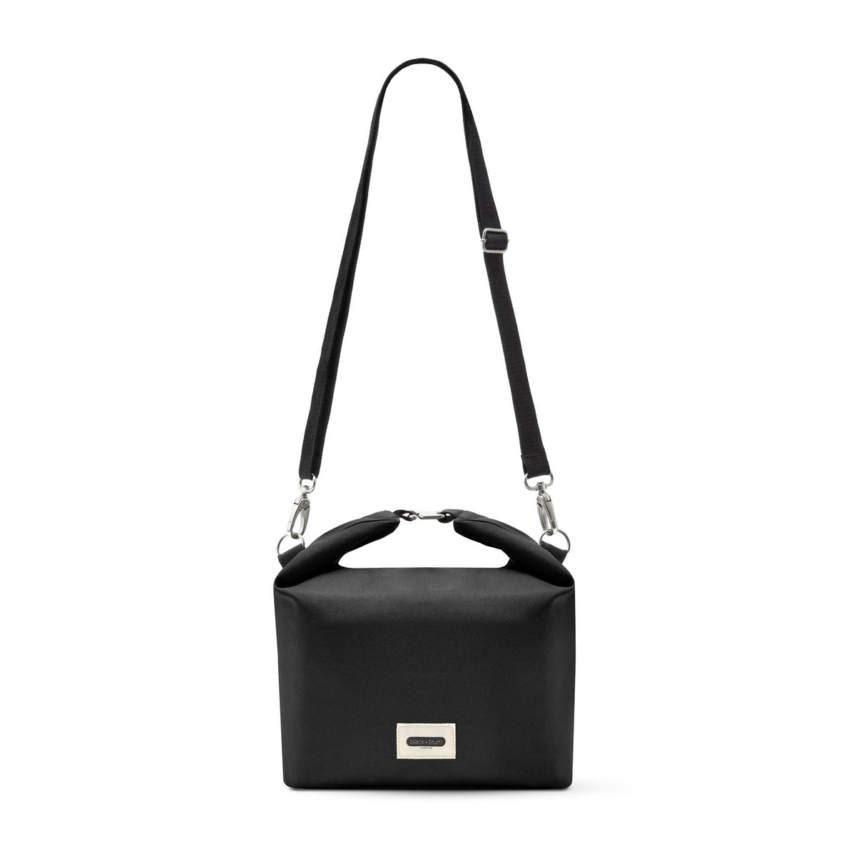 BLACK+BLUM insulated lunchbag with a sleek black design, featuring a spacious interior for lunch and snacks.