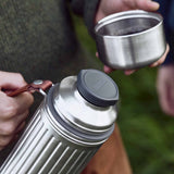 BLACK+BLUM DUO stainless steel insulated bottle, 1.4L, with double-wall design for hot or cold drinks, shown in the image.