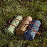 Green BLACK+BLUM picnic blanket, 2 x 1.4 meters, outdoor blanket with soft fabric and spacious design for outdoor use.