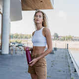 ALADDIN City Loop insulated bottle in red with 600 ml capacity, featuring a sleek design and secure lid for hot or cold drinks.