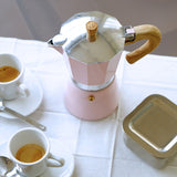 Pink GNALI & ZANI Venezia espresso maker with a classic stovetop design, featuring a polished metal finish.