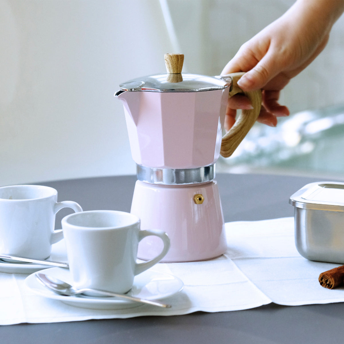 Pink GNALI & ZANI Venezia espresso maker with a classic stovetop design, featuring a polished metal finish.