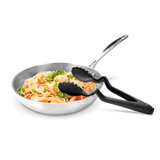 Black DREAMFARM Küchenzange CLONGS with stainless steel tips for precise gripping and serving in the kitchen.