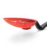 DREAMFARM Schaumkelle mit Tropfschale, Big Lest in stainless steel, used for steaming and serving food with a large handle.