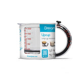 DREAMFARM messbecher (measuring cup) with clear measurements and handle, designed for accurate liquid measurement in the kitchen.