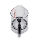 DREAMFARM messbecher measuring cup with clear markings, made of durable plastic, featuring a handle for easy pouring.