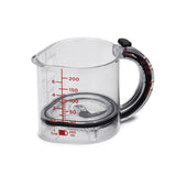DREAMFARM Messbecher measuring cup with clear markings and handle, made of durable plastic for precise liquid measurement