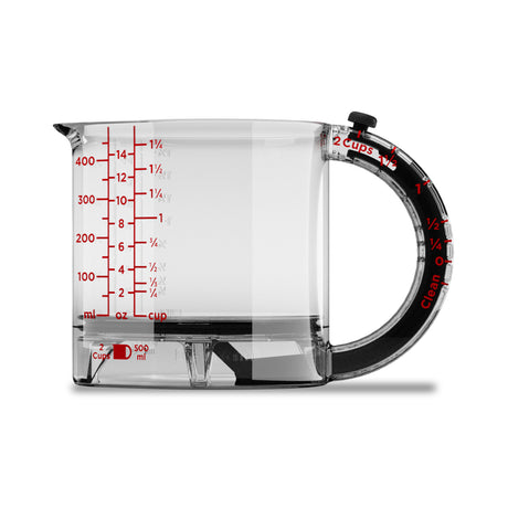 DREAMFARM messbecher measuring cup with clear markings and a sturdy handle for accurate liquid measurements.