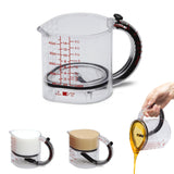 DREAMFARM messbecher measuring cup with clear markings, made of durable plastic, shown on a white background.