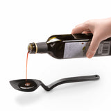 DREAMFARM 3-in-1 Kochlöffel (Spoon) with ergonomic handle and versatile design for cooking and stirring.