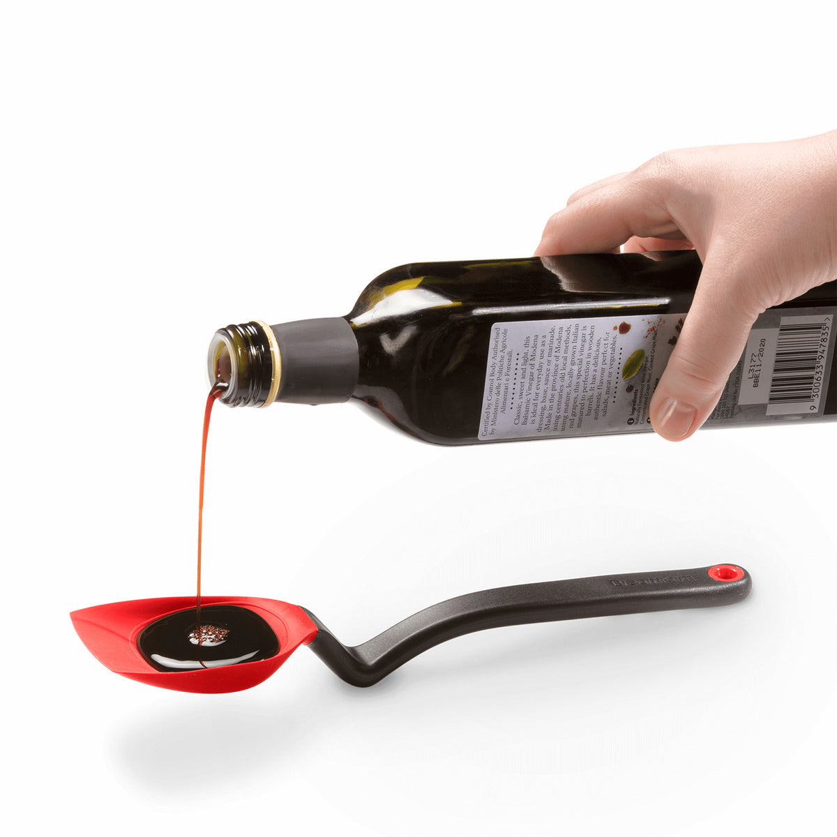 DREAMFARM 3-in-1 Kochlöffel (Spoon) with ergonomic handle and multiple functional ends for versatile cooking tasks.