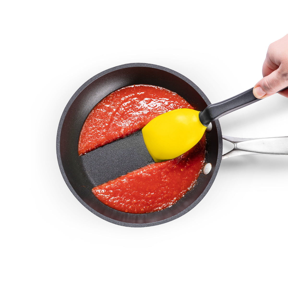 DREAMFARM 3-in-1 Kochlöffel (Spoon) with ergonomic handle and versatile design for stirring and serving in the kitchen.