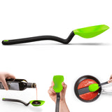DREAMFARM 3-in-1 Kochlöffel (Spoon) with ergonomic handle, versatile cooking tool for stirring, serving, and mixing in the kitchen.