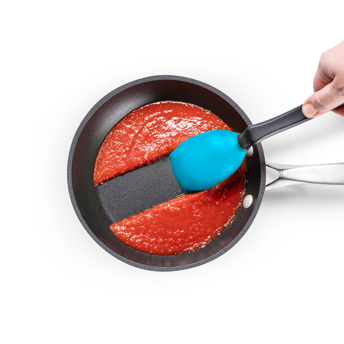 DREAMFARM 3-in-1 Kochlöffel (spoon) for cooking and serving, with ergonomic handle and versatile design.