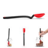 DREAMFARM mini cooking spoon with a wooden handle, ideal for stirring and serving in kitchen cooking and baking tasks.