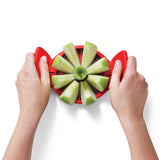 DREAMFARM red apple slicer FLAPPLE with 12.6 cm blade, designed for easy apple cutting and sectioning.