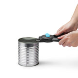 DREAMFARM black can opener, 19.5 cm, with a curved handle and turning crank for easy opening of cans.