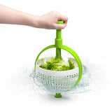 DREAMFARM 2-in-1 salad spinner in green with 3.4-liter capacity, featuring a compact design for washing and drying greens.