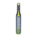 DREAMFARM fine and concave kitchen grater in green with three sides for versatile food grating and zesting.