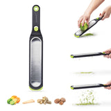 DREAMFARM fine and concave kitchen grater in green, with sharp edges for grating spices, cheese, and vegetables.