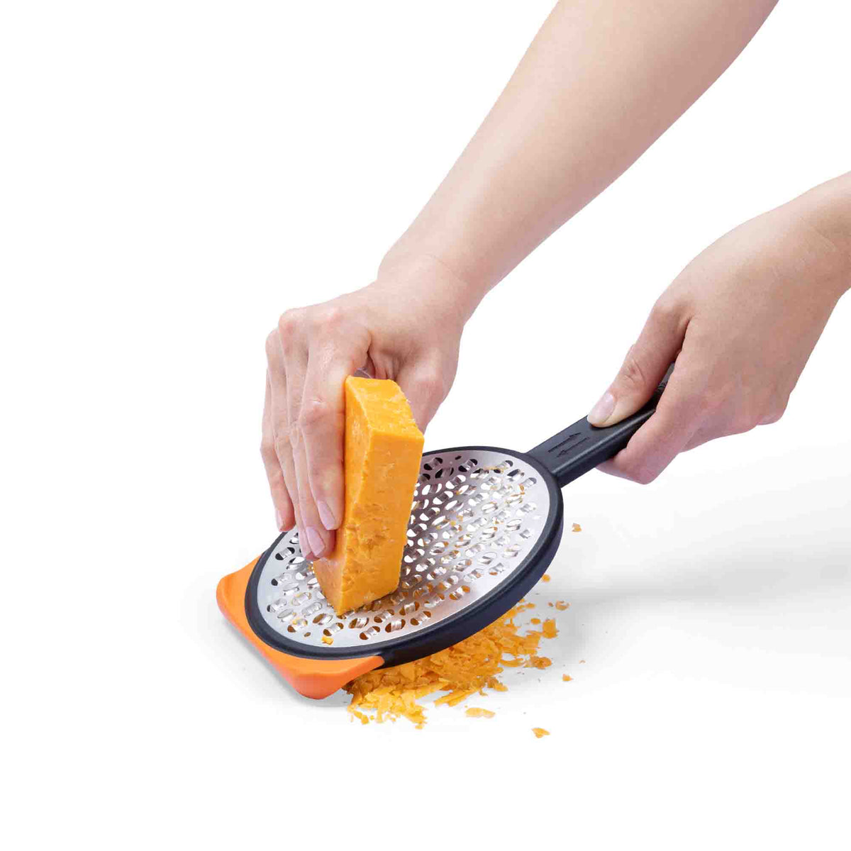 DREAMFARM Küchenreibe OGRATE in silber with textured grating surface for efficient food preparation.