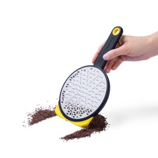 DREAMFARM silver kitchen grater with multiple grating surfaces, ideal for cheese, vegetables, and spices.