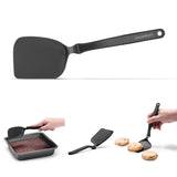 DREAMFARM mini kitchen spatula, black Küchenwender with a compact design for easy cooking and flipping.