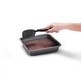 DREAMFARM mini Küchenwender Chopping spatula in black, ideal for cooking and stirring in the kitchen.