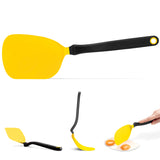 DREAMFARM Chopula frying pan spatula, black silicone and stainless steel cooking utensil for flipping and serving food.