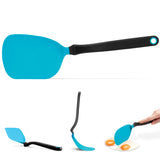 DREAMFARM CHOPULA frying pan spatula with a black handle and stainless steel head for flipping and serving food.