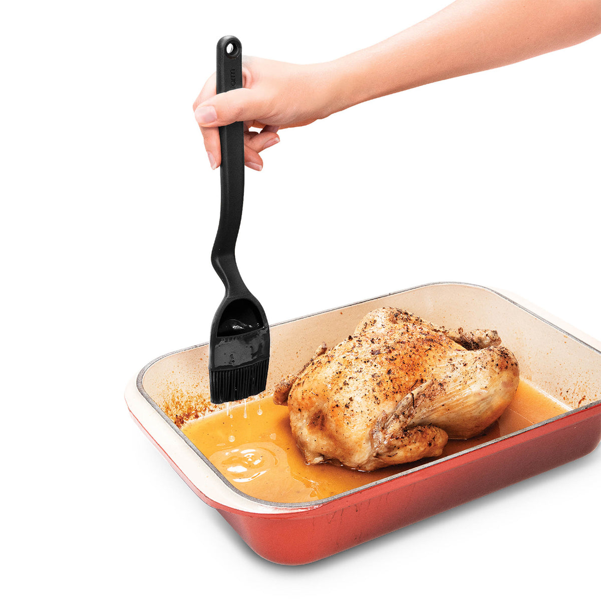 DREAMFARM BRIZZLE Kochpinsel with wooden handle and synthetic bristles for precise cooking and baking tasks.