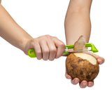 Green DREAMFARM Y-Schäler Sharple vegetable peeler with ergonomic handle for easy peeling of fruits and vegetables.