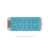 White DREAMFARM ice cube tray with multiple compartments for making ice cubes, made of durable plastic.