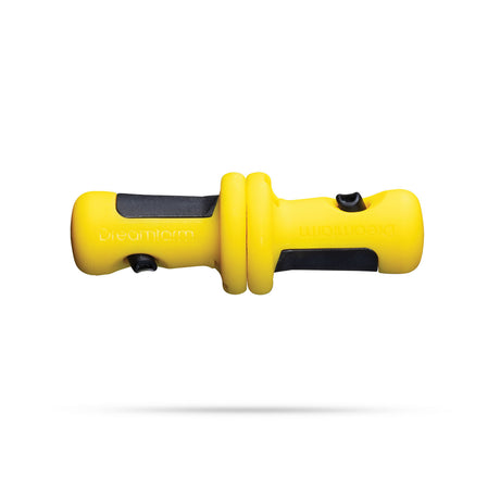 Yellow DREAMFARM corn cob holder set with four clips, designed to securely hold corn on the cob during eating.