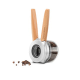 DREAMFARM ORTWO black spice grinder with a sleek cylindrical design and textured grip for easy grinding.