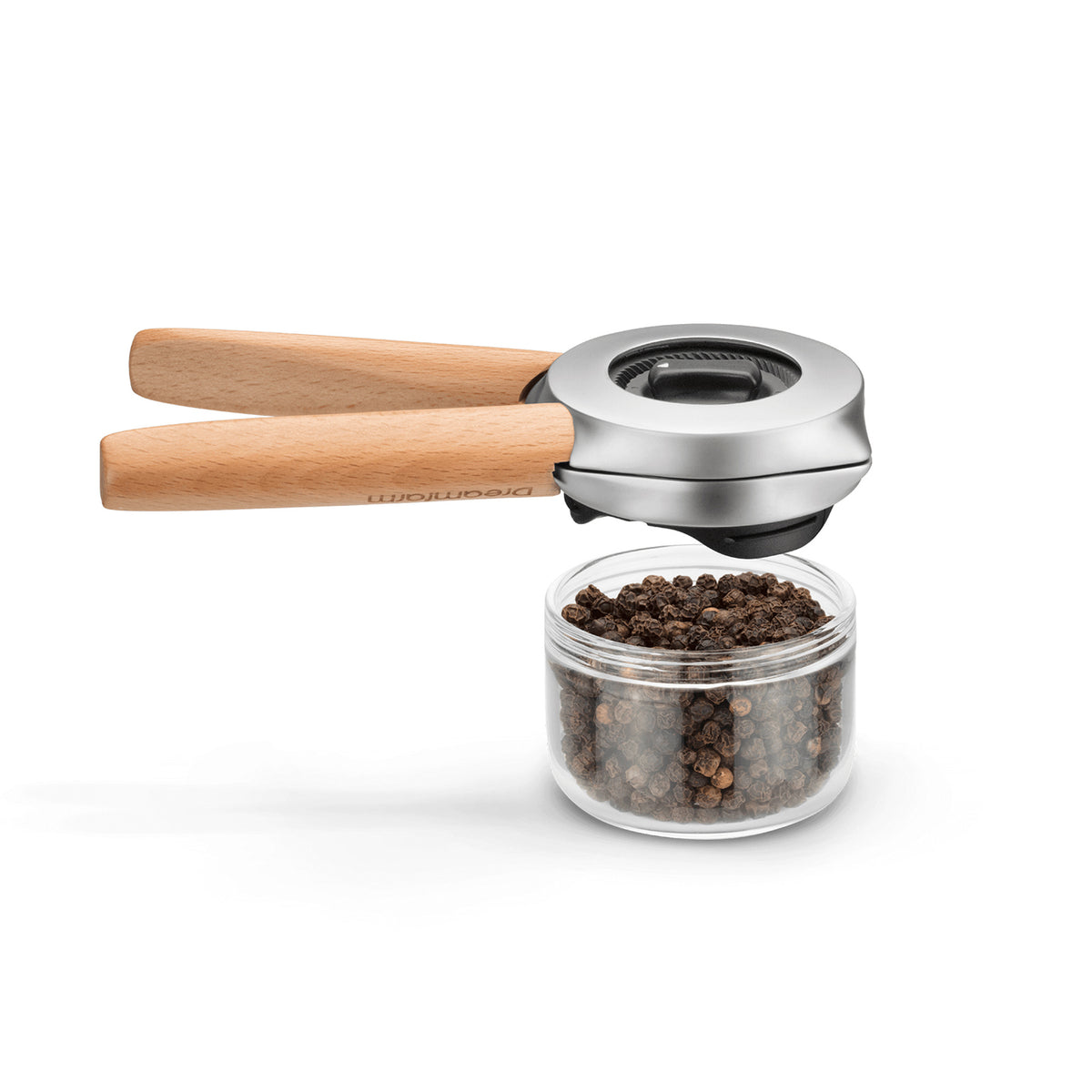DREAMFARM ORTWO black spice grinder with stainless steel top and clear ceramic body for fresh seasoning.