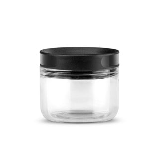 DREAMFARM ORTWO black spice grinder with a sleek modern design, showing the grinder's ceramic grinding mechanism.