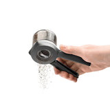 DREAMFARM ORTWO black spice mill with a sleek design and adjustable grinding mechanism.