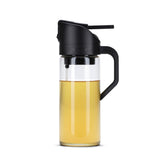 DREAMFARM Ölsprüh-Flasche OILEROO in schwarz, 400ml, with spray nozzle for oil application, shown from front angle.
