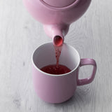 Pink Kensington teapot by Price & Kensington, with a smooth, pastel pink ceramic finish and classic teapot shape.